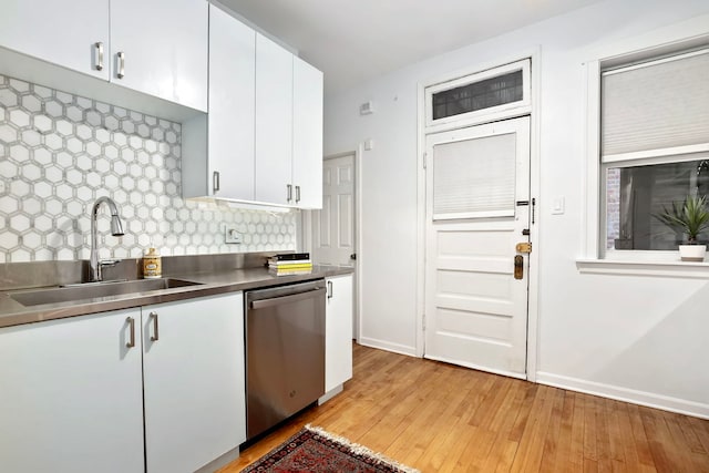 2127 W Pierce Ave Unit 2A, Chicago, IL 60622 - kitchen featuring stainless steel counters, stainless steel dishwasher, backsplash, light wood finished floors, and white cabinetry