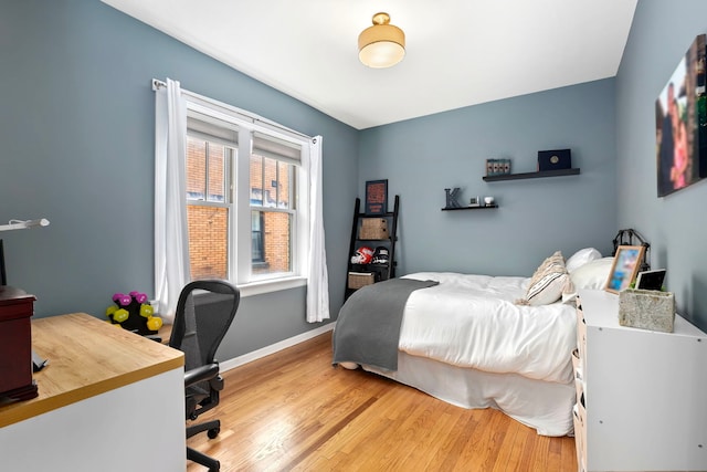 2127 W Pierce Ave Unit 2A, Chicago, IL 60622 - bedroom featuring wood finished floors and an office area