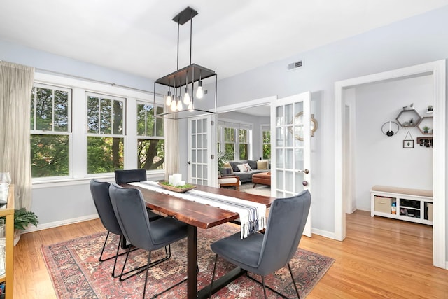 2127 W Pierce Ave Unit 2A, Chicago, IL 60622 - dining space featuring french doors and light wood finished floors