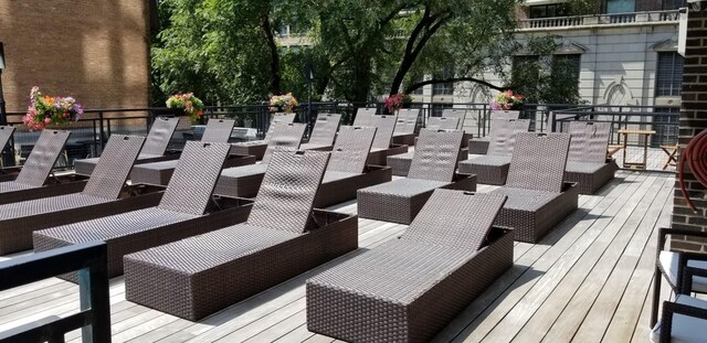 21 W Goethe St Unit 7C, Chicago, IL 60610 - view of community featuring an outdoor hangout area and a wooden deck