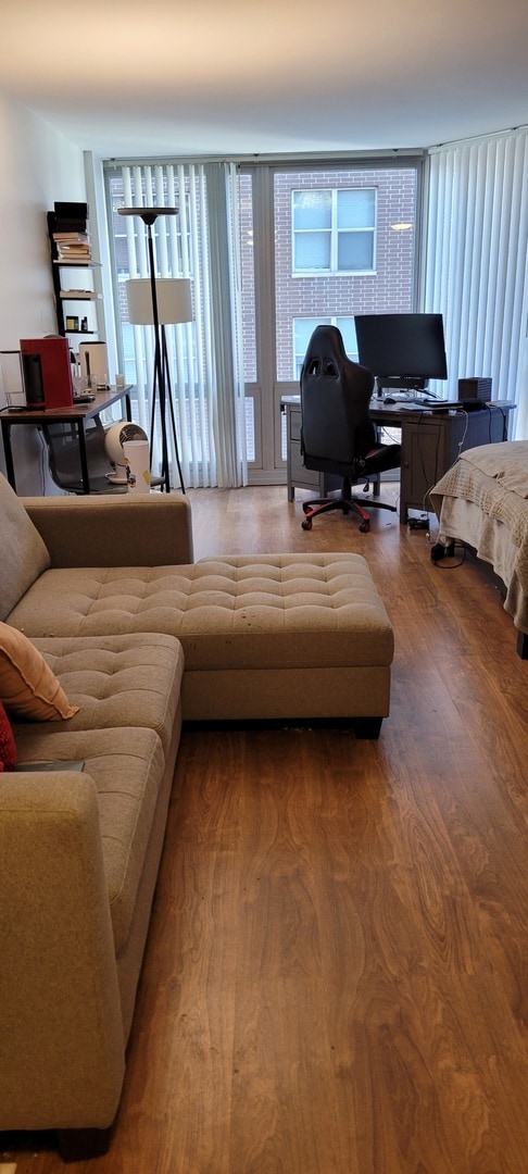 21 W Goethe St Unit 7C, Chicago, IL 60610 - living area with an office area and wood finished floors