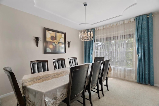 13613 Arborview Blvd, Plainfield, IL 60585 - carpeted dining area featuring a chandelier and baseboards
