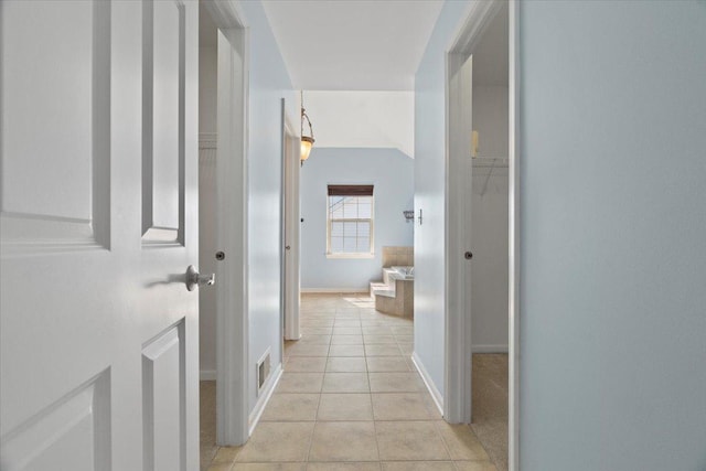 13613 Arborview Blvd, Plainfield, IL 60585 - corridor with light tile patterned floors and baseboards