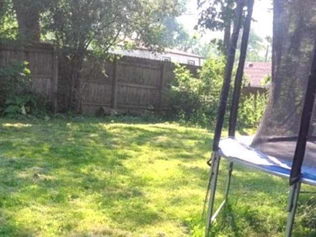 348 Niagara St, Park Forest, IL 60466 - view of yard with a trampoline