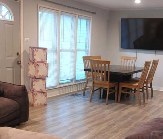 348 Niagara St, Park Forest, IL 60466 - dining area with wood finished floors, ornamental molding, and recessed lighting