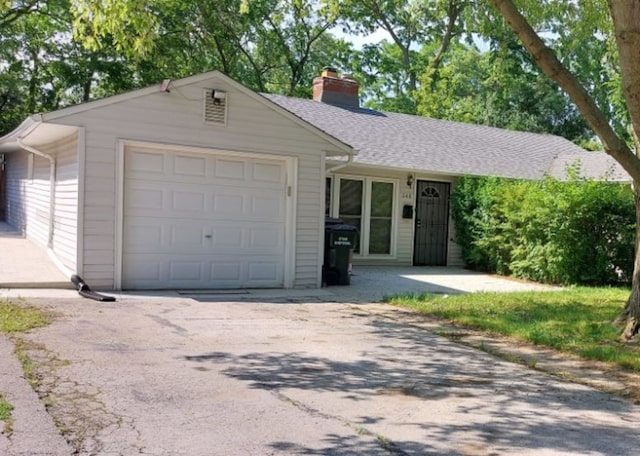 348 Niagara St, Park Forest, IL 60466 - single story home with a chimney, an attached garage, and concrete driveway