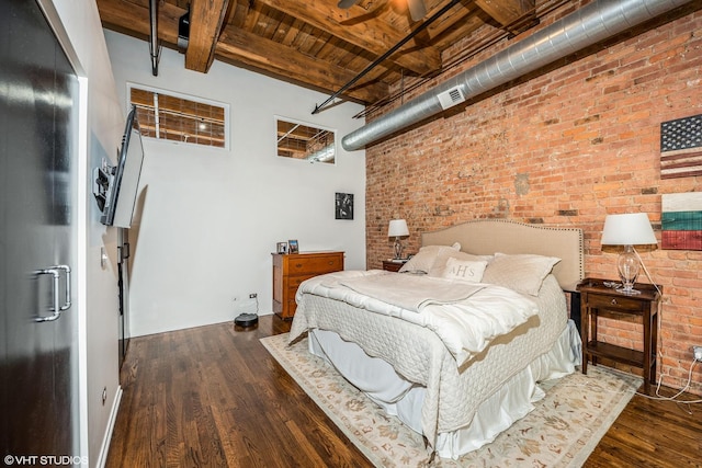1243 S Wabash Ave Unit 302, Chicago, IL 60605 - bedroom with wood ceiling with exposed beams, brick wall, and dark wood-style flooring