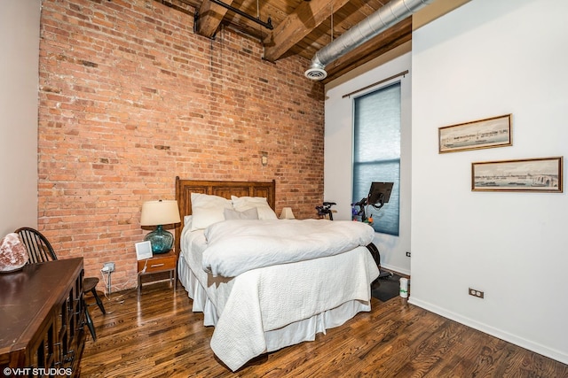 1243 S Wabash Ave Unit 302, Chicago, IL 60605 - bedroom featuring wooden ceiling with exposed beams, brick wall, wood finished floors, and baseboards