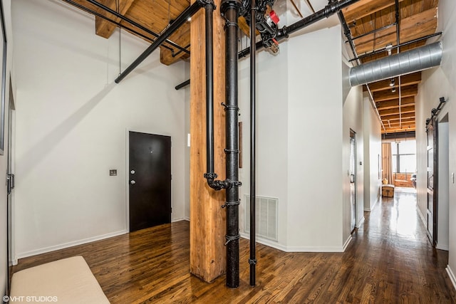 1243 S Wabash Ave Unit 302, Chicago, IL 60605 - hall featuring wood finished floors, baseboards, and a towering ceiling