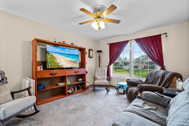 334 Idlewood Dr, Bolingbrook, IL 60440 - carpeted living room featuring ceiling fan, baseboards, and radiator