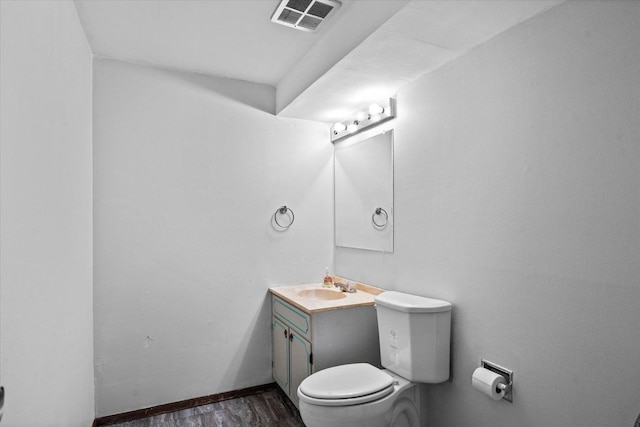 334 Idlewood Dr, Bolingbrook, IL 60440 - bathroom featuring toilet, vanity, wood finished floors, and baseboards