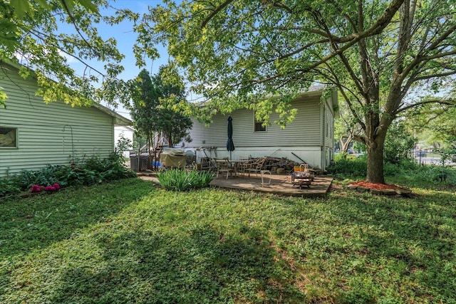 334 Idlewood Dr, Bolingbrook, IL 60440 - view of green lawn with a patio