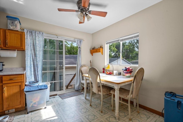 334 Idlewood Dr, Bolingbrook, IL 60440 - dining space featuring plenty of natural light, ceiling fan, light floors, and baseboards