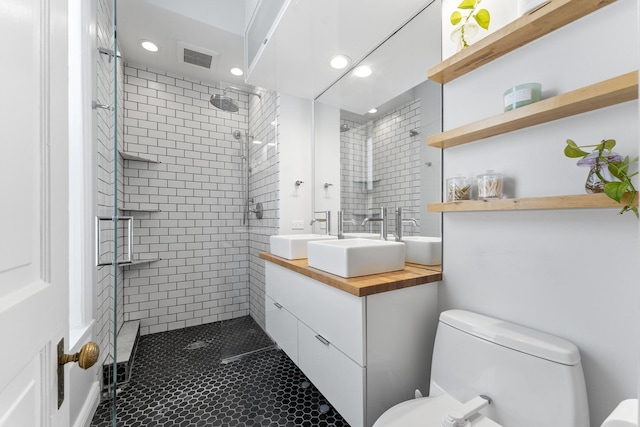 1128 W Wolfram St Unit 2, Chicago, IL 60657 - full bathroom with a stall shower, vanity, recessed lighting, and tile patterned flooring