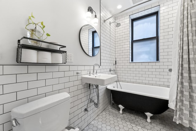 1128 W Wolfram St Unit 2, Chicago, IL 60657 - full bath with tile walls, tile patterned flooring, wainscoting, and a combined bath / shower with freestanding tub