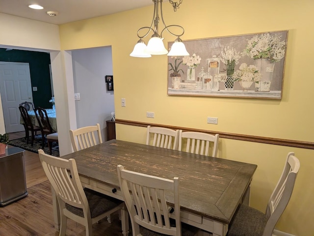 301 N Redfield Ct, Park Ridge, IL 60068 - dining area featuring wood finished floors and a chandelier