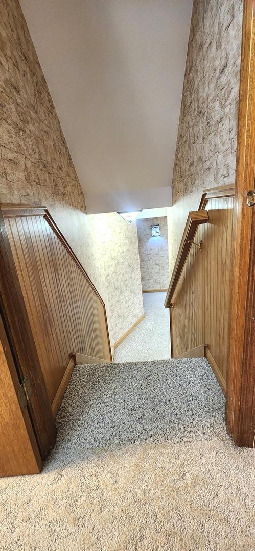 18068 Jason Ln, Lansing, IL 60438 - stairs with carpet and lofted ceiling