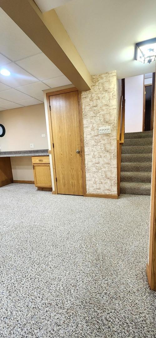18068 Jason Ln, Lansing, IL 60438 - finished basement featuring stairway