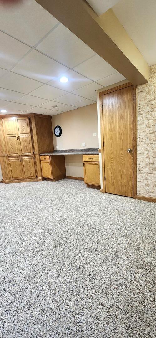 18068 Jason Ln, Lansing, IL 60438 - finished below grade area with baseboards and a drop ceiling