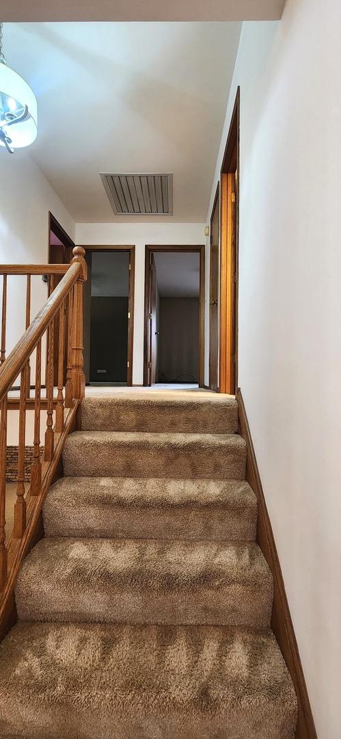 18068 Jason Ln, Lansing, IL 60438 - stairway with carpet