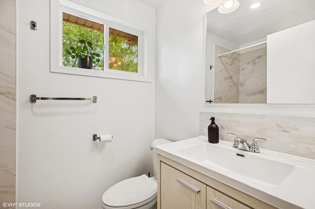 5016 Suffield Ct Unit A, Skokie, IL 60077 - bathroom featuring tasteful backsplash, vanity, and a marble finish shower