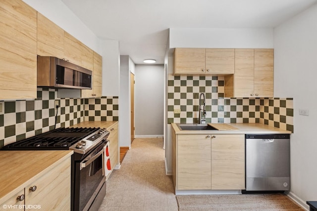 5016 Suffield Ct Unit A, Skokie, IL 60077 - kitchen with appliances with stainless steel finishes, light brown cabinetry, and light countertops