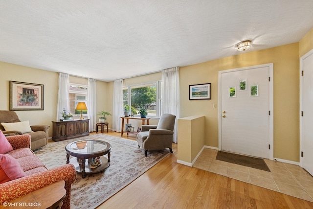 1613 Douglas St, Joliet, IL 60435 - entrance foyer with baseboards and light wood-style floors