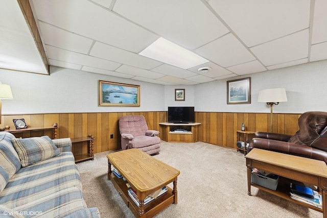1613 Douglas St, Joliet, IL 60435 - living area with wainscoting, carpet floors, a paneled ceiling, and wooden walls