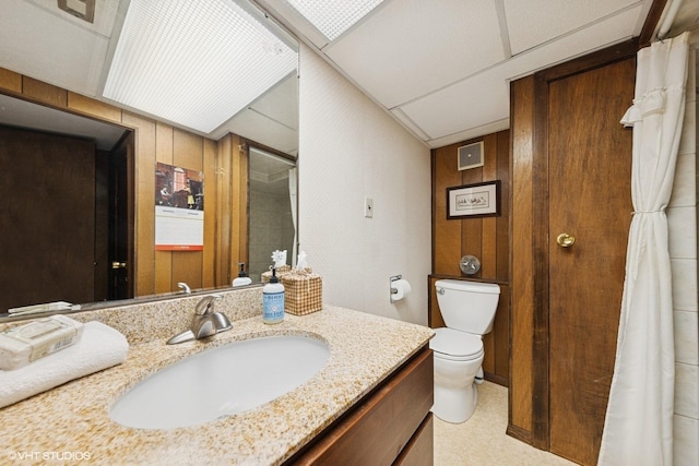 1613 Douglas St, Joliet, IL 60435 - full bath featuring vanity, a shower with curtain, and wood walls