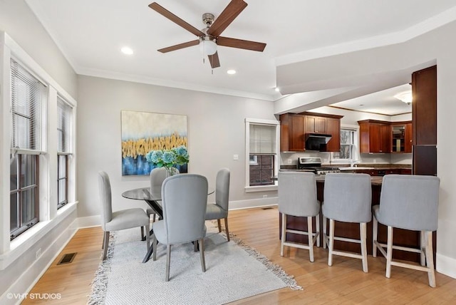 815 Linden Ave, Wilmette, IL 60091 - dining room with ornamental molding, ceiling fan, light wood-type flooring, baseboards, and recessed lighting