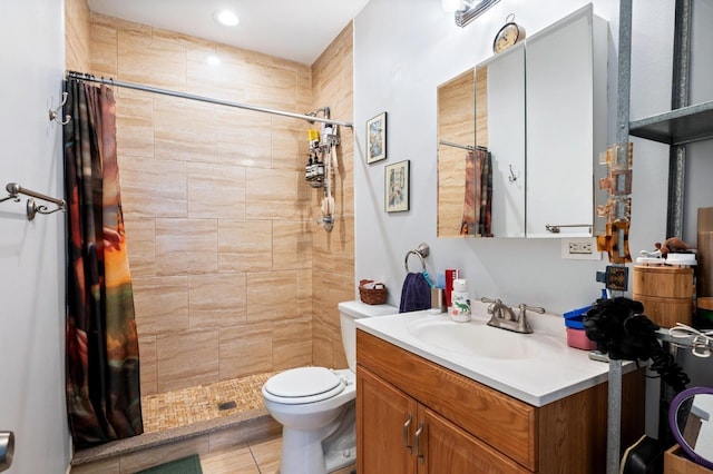 3137 N Monticello Ave, Chicago, IL 60618 - bathroom with vanity, toilet, a tile shower, and recessed lighting