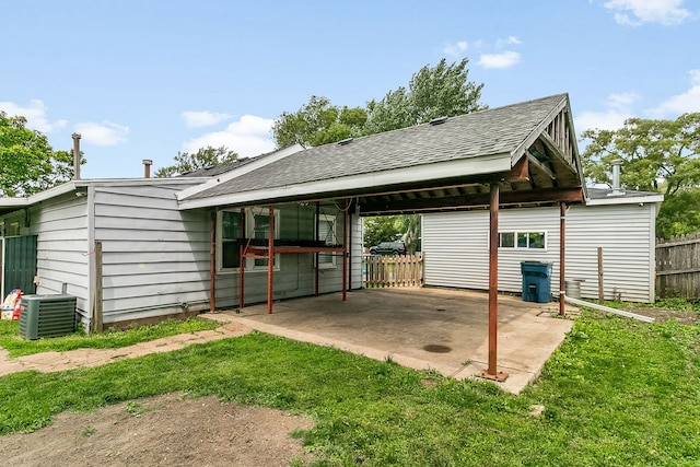 2303 Sweetbriar Ave, Crest Hill, IL 60403 - view of parking featuring a carport