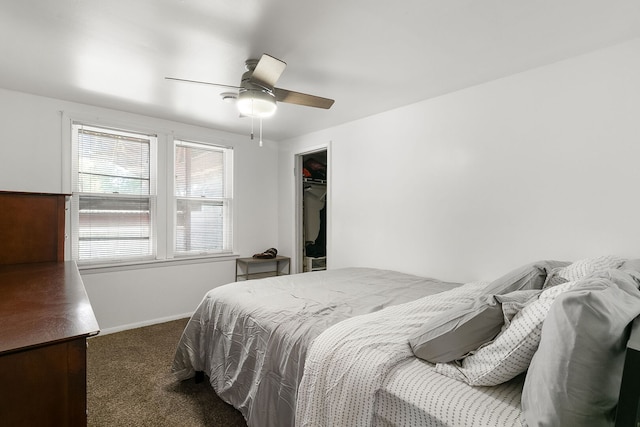 2303 Sweetbriar Ave, Crest Hill, IL 60403 - carpeted bedroom with baseboards, ceiling fan, a closet, and a spacious closet