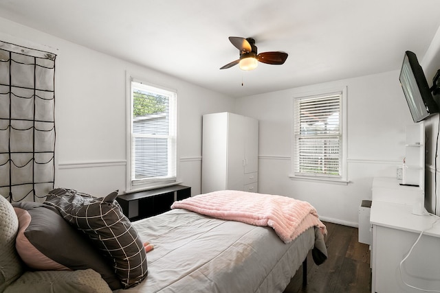2303 Sweetbriar Ave, Crest Hill, IL 60403 - bedroom with dark wood-style flooring, baseboards, and ceiling fan