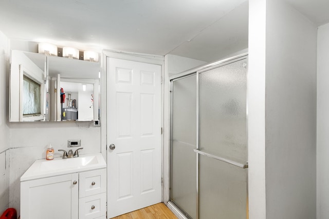 2303 Sweetbriar Ave, Crest Hill, IL 60403 - full bathroom with a shower with shower door, vanity, and wood finished floors