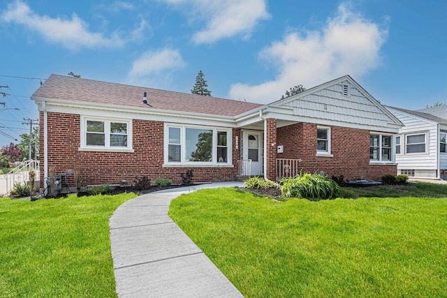 116 N 8th Ave, Des Plaines, IL 60016 - view of front of home featuring brick siding and a front yard