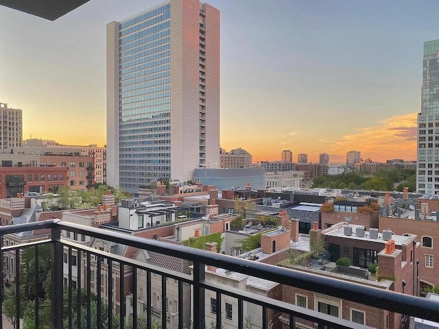 451 W Huron St Unit 905, Chicago, IL 60654 - balcony at dusk featuring a view of city