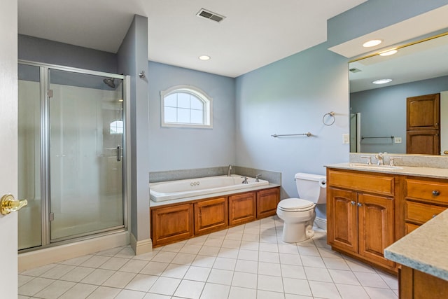3208 Countrybend Ln, Champaign, IL 61822 - bathroom with vanity, a stall shower, a garden tub, tile patterned flooring, and recessed lighting