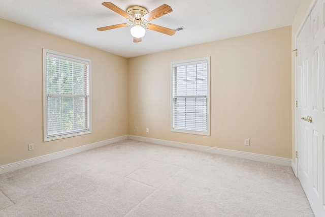 3208 Countrybend Ln, Champaign, IL 61822 - spare room featuring light colored carpet and ceiling fan
