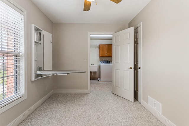 3208 Countrybend Ln, Champaign, IL 61822 - hallway featuring washer / dryer and light colored carpet