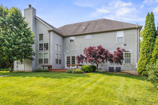 3208 Countrybend Ln, Champaign, IL 61822 - back of house featuring a lawn, a chimney, and a wooden deck