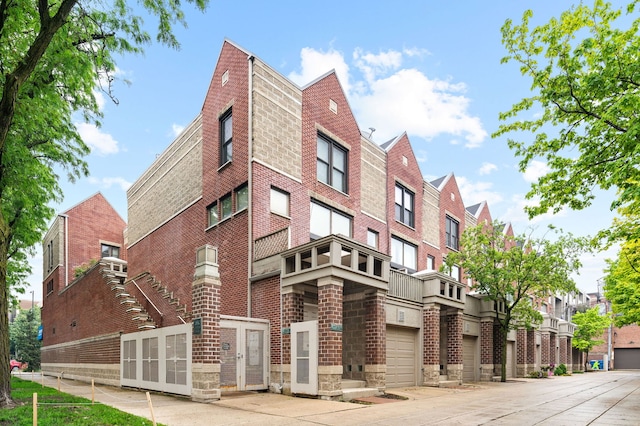 2757 N Wayne Ave Unit E, Chicago, IL 60614 - view of building exterior featuring a garage