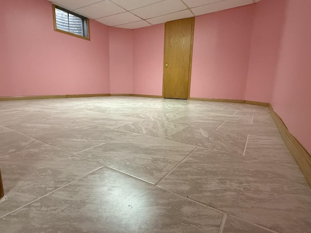 8020 Latrobe Ave, Burbank, IL 60459 - empty room featuring a drop ceiling and baseboards