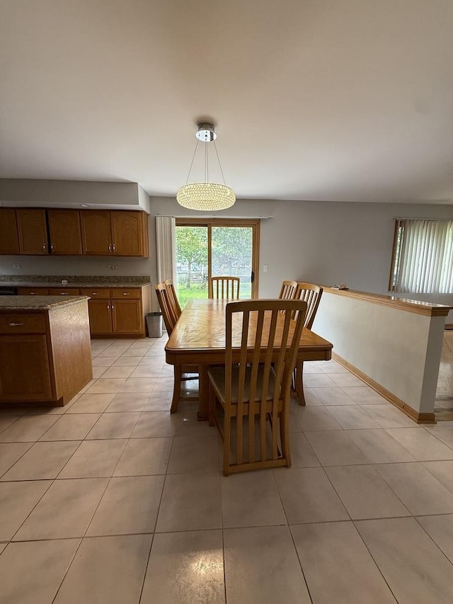 8020 Latrobe Ave, Burbank, IL 60459 - dining space with light tile patterned floors and baseboards