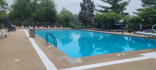 6617 Foxtree Ave, Woodridge, IL 60517 - community pool with a patio and view of scattered trees