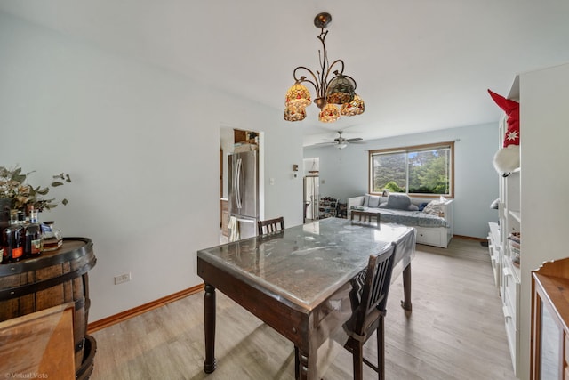 6617 Foxtree Ave, Woodridge, IL 60517 - dining room with ceiling fan, light wood-style floors, and a chandelier