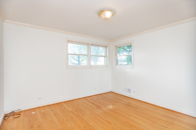 2519 Sunnyside Ave, Westchester, IL 60154 - unfurnished room with light wood-style flooring and ornamental molding