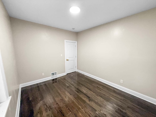 2914 Ridge Rd, Lansing, IL 60438 - spare room featuring dark wood-style floors and baseboards