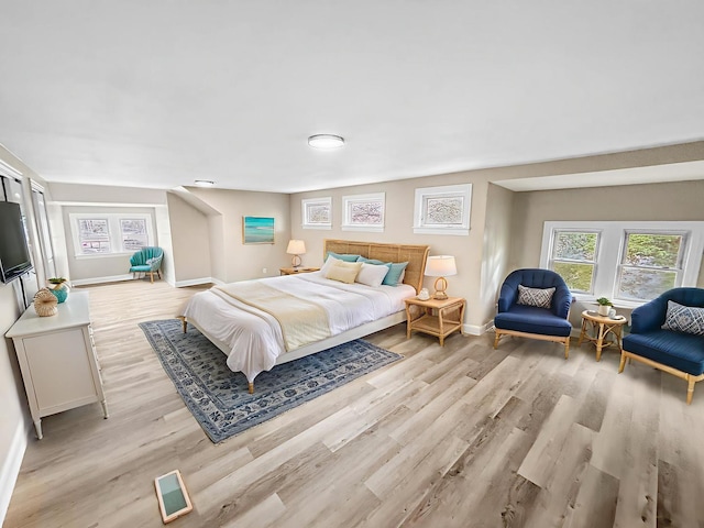 2914 Ridge Rd, Lansing, IL 60438 - bedroom with light wood-style flooring and multiple windows