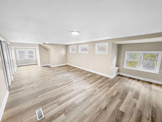 2914 Ridge Rd, Lansing, IL 60438 - unfurnished living room featuring light wood-type flooring and healthy amount of natural light